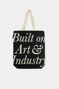 Provide Built on Art and Industry black Tote Bag with hand logo (front)
