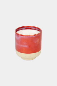 Provide red glazed ceramic candle with hand logo imprint