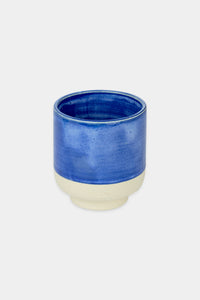 Provide blue glazed ceramic cup with hand logo imprint