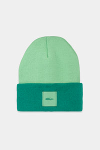 Provide green beanie with hand logo patch stitched on to front (front)