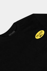 Provide black Tee with yellow oval hand logo on right chest (close up)